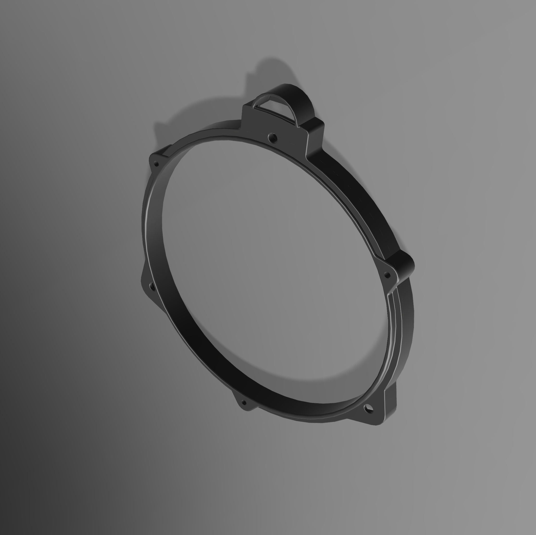 Black plastic ring adapter on a grey background